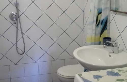 Giannella Casa | Holiday Home 'Residence Giannella - Gardenia 12' with Private Garden