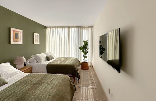 San Miguel Chapultepec Condominio | Charming Condesa Gem: Cozy, Views & Luxe Amenities