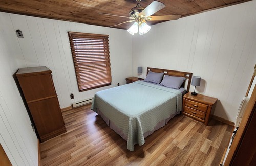 Lake Casa | Blissful Bluff Lake Retreat: 4BR House with Sandy Beach & Walkout Basement