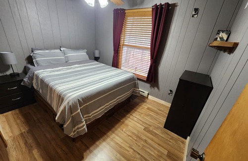 Lake Casa | Blissful Bluff Lake Retreat: 4BR House with Sandy Beach & Walkout Basement