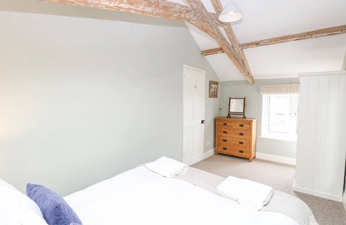 Tunstead Cabaña | THE COACH HOUSE, pet friendly, with pool in Stalham
