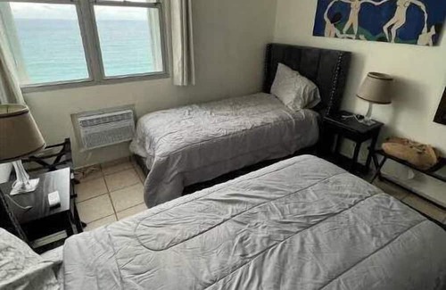 La Pared Casa | 15th Floor Beachfront 2 Bedroom Condo with Pool & Ocean View at Sandy Hills