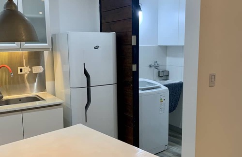Villa Rosa Condominio | Cozy 4-bedroom condo with AC and WiFi in enjoyable Lagoon Pilar