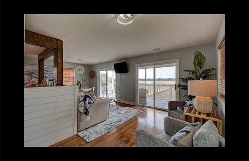 Midway Casa | Waterfront with dock, pool and boat lift, crab traps and paddle boards. Yes-Pets