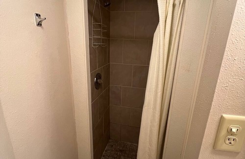 Onalaska Casa | Overlooking Lake Onalaska -- full-size bed + bath in nostalgic motel