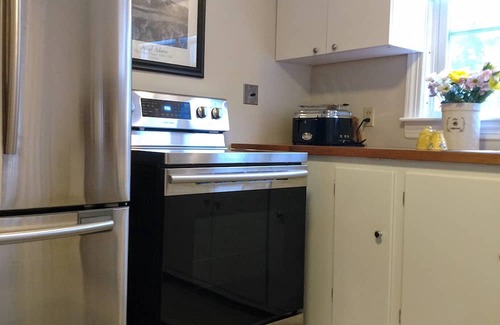 Pawtuxet Village Historic District Casa | A Curated Cape on the Cove....walk to shops and restaurants in seaside village.