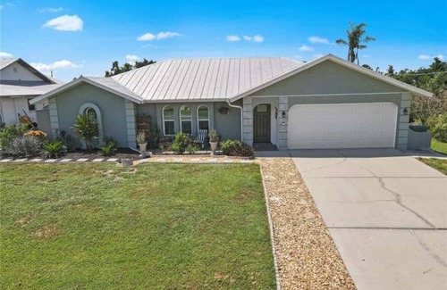 Harbour Heights Casa | Paradise Awaits. Beautiful Home with Pool located on a canal with dock