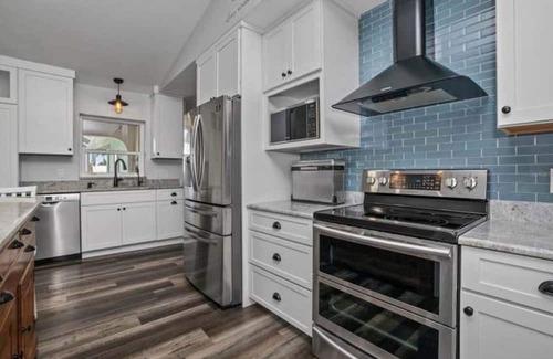 Harbour Heights Casa | Paradise Awaits. Beautiful Home with Pool located on a canal with dock