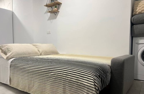 El Pilar Apartamento | Spacious Madrid Haven:Explore the Best of the City from Your Stylish RetreatTen!