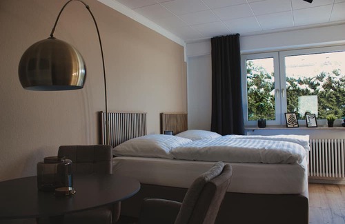 Korntal-Munchigan Apartamento | Modern & Comfortable Apartment Stuttgart - Netflix - 4K TV - Waipu