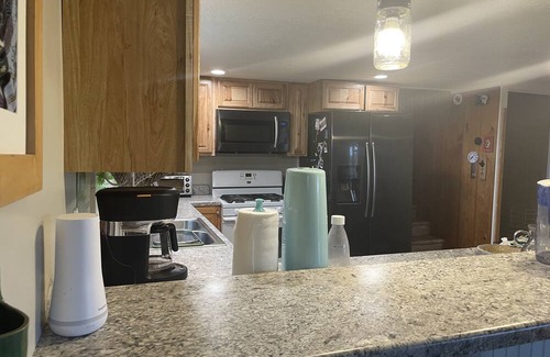 Pentwater Cabaña | Cozy 3-bedroom cottage, large yard, minutes from Lake Michigan. Pet friendly.