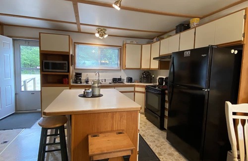 Denare Beach Cabaña | Cozy Private lake front cabin with sand beach!