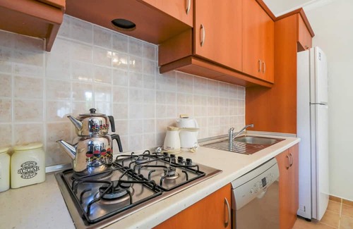 Camyuva Apartamento | Peaceful Flat with Shared Pool in Camyuva Kemer
