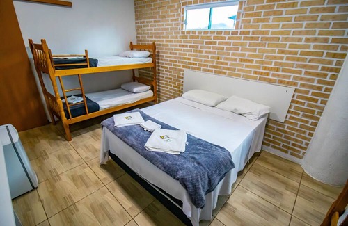 Praia da Armacao do Itapocoroi Casa | Familia PLus - Quarto para até 6 pessoas