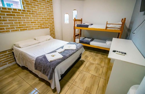 Praia da Armacao do Itapocoroi Casa | Familia PLus - Quarto para até 6 pessoas