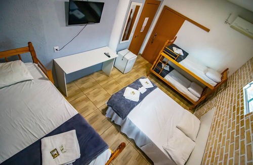 Praia da Armacao do Itapocoroi Casa | Familia PLus - Quarto para até 6 pessoas