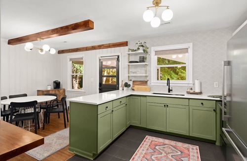 Gantt Casa | Weekend at GiGi's - a Greenville Mid-Century home with fire pit and game room.