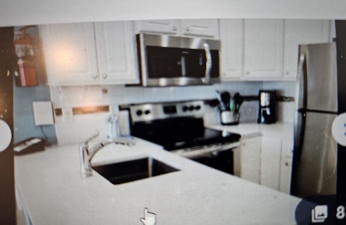 Colliers Bay Condominio | Morritt's Tortuga Club :Three pools , lovely beach and pier. 2Bd/2Bth.