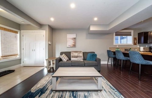 St. Albert Casa | Beautiful walkout basement suite with floor to ceiling windows and a great view