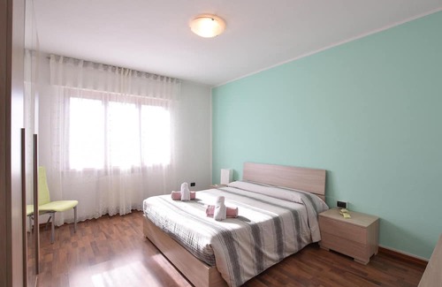 Lamon Apartamento | Look forward to a wonderful view of the countryside in this vacation apartment.