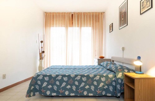 Lignano Sabbiadoro Villa | Cozy and welcoming single house with private garden by Beahost Rentals