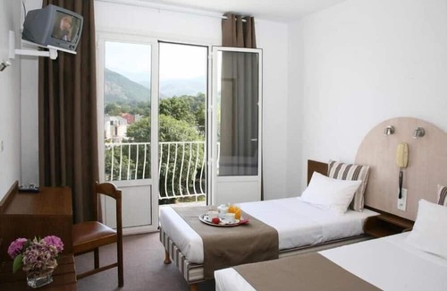 Lourdes Hotel | Relax in Comfort, Pet-Friendly, Free Parking, Onsite Restaurant, Scenic Views!