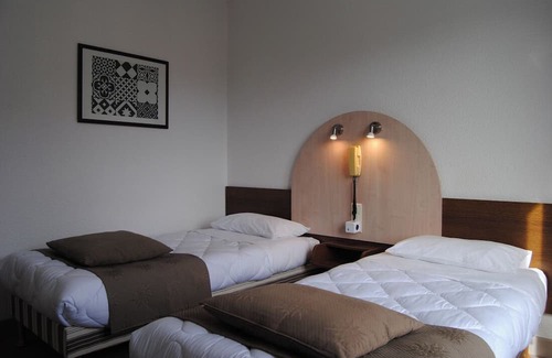 Lourdes Hotel | Relax in Comfort, Pet-Friendly, Free Parking, Onsite Restaurant, Scenic Views!