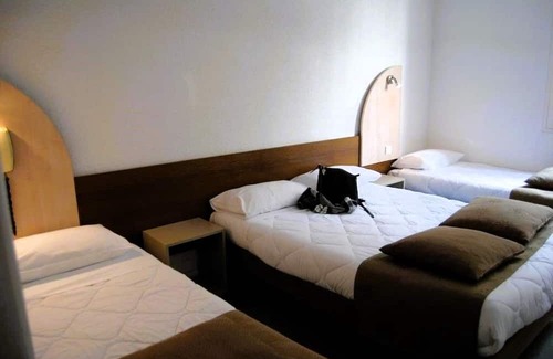 Lourdes Hotel | Comfortable Stay w/Pet-Friendly Rooms & Convenient Parking