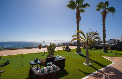 Playa Blanca Villa | Villa Costa Roja with swimming pools, jacuzzi, mini golf, paddle tennis and sea and volcano views