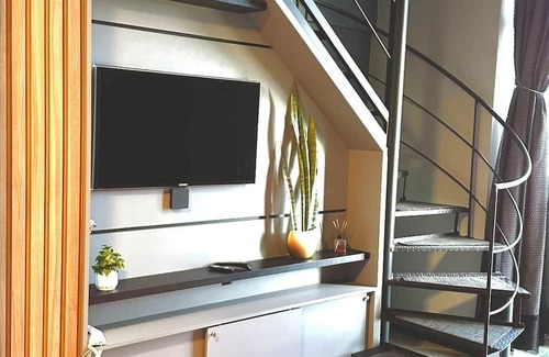Czerniewicz Apartamento | The loft is centrally located, has a hot tub, a privileged view, a swimming pool, and a gym.