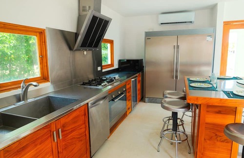 Playa Blanca Casa | Spacious 5-bedroom luxury villa with pool, golf view & Steps from the beach.