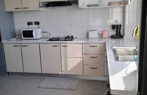 Mbotela Apartamento | Enchanting 5-bedroom apartment with fitness room in Nairobi
