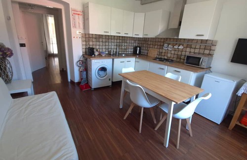 La Foce Apartamento | Apartment 'Maison18' with Balcony, Wi-Fi and Air Conditioning