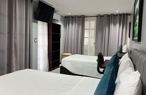Agonia Cama Y Desayuno | Great expeirence bed & breakfast with AC in down town Alajuela