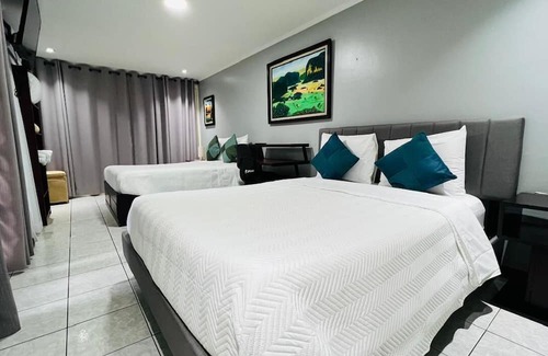 Agonia Cama Y Desayuno | Great expeirence bed & breakfast with AC in down town Alajuela