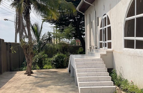 Abeokuta Casa | Newly renovated almost heaven 2 bdrm; large living room with view of courtyard.