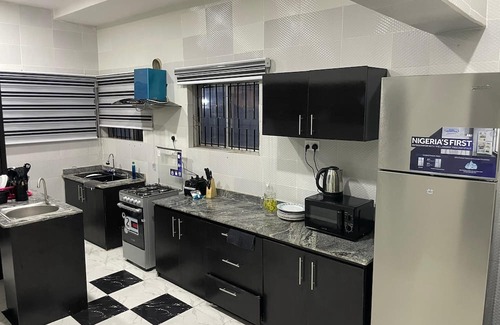 Abeokuta Casa | Newly renovated almost heaven 2 bdrm; large living room with view of courtyard.