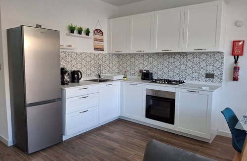 Munxar Apartamento | Water Lily Oasis Courtyard Apartment - 5min Walk to Beach