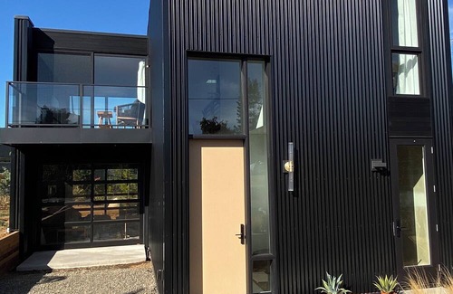 Courtenay Casa | Modern, sunny, eco retreat perched above a trendy jewelry studio!