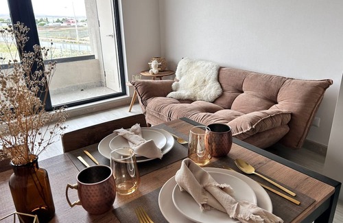Puerto Natales Apartamento | Dpto El Ovejero, ideal for a romantic getaway.