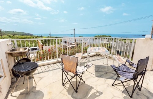 Miyakojima Villa | Exclusive view of the star-filled sky on the rooftop terrace. Walking distance from Imgarma Marine Garden (1.1km). Privileges: Free Miyako soba noodles, BBQ set rental, and star photography can be arranged. Unattended check-in support.