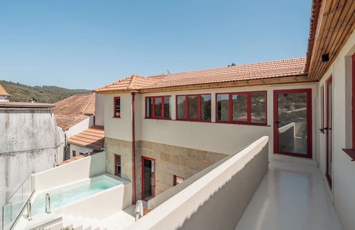 Castelo de Paiva Apartamento | Pool and Indoor Jacuzzi in Pedorido by HostWise
