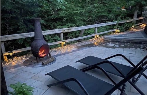Monroe Cabina | European inspired 2-bedroom cabin with a brooke in back patio, in Monroe, NY.