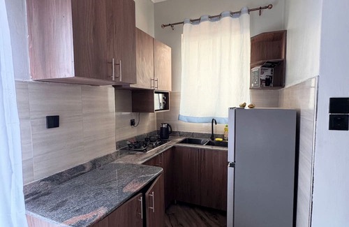 Kampala Apartamento | Cozy 1-bedroom Studio apartment in charming Kampala with WiFi, AC and Netflix