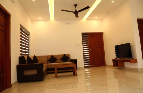Chengannur Villa | Ethereal Retreat 4-bedroom villa in delightful Chengannur with WiFi, AC