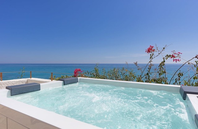 Charming Costa Blanca Villa | Villa Robero | 3 Bedrooms | Beachfront | Spectacular Sea Views | Spacious Furnished Sun Terrace with Private Hot Tub | BBQ facilities | Outdoor Dining Area | Villajoyosa