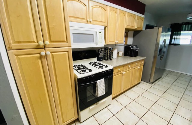 Spacious family friendly central home. Located near YRMC, Airport, & much more!