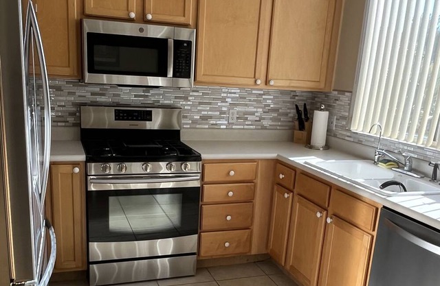 Updated home in 55+ community with pool, gym and courts.
