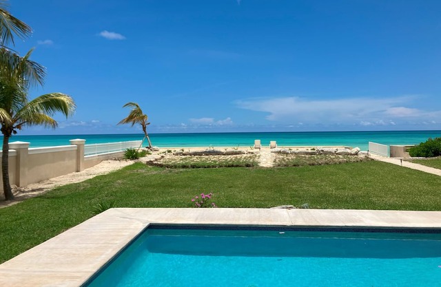 Beach front pool home with striking views and space for family and friends.