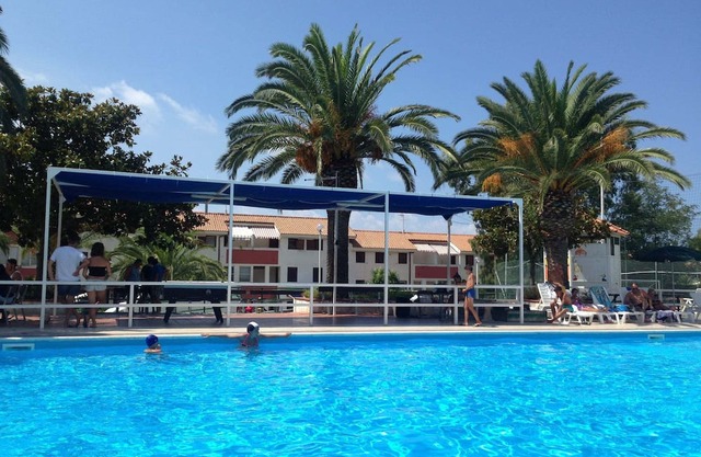 Holiday Apartment "Bilocale 82 Residence La Giungla" with Sea View, Shared Pool & Wi-Fi